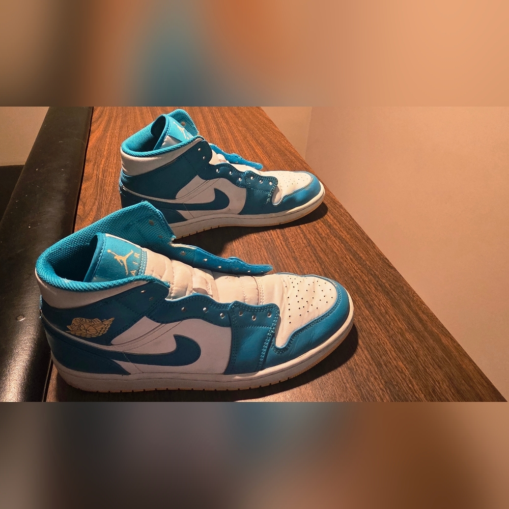 Air Jordan High-Top Sneakers in Blue and White.